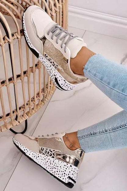 Women leopard print lace-up sneakers with white upper and metallic gold heel, speckled sole on Tampa Home & Garden Store