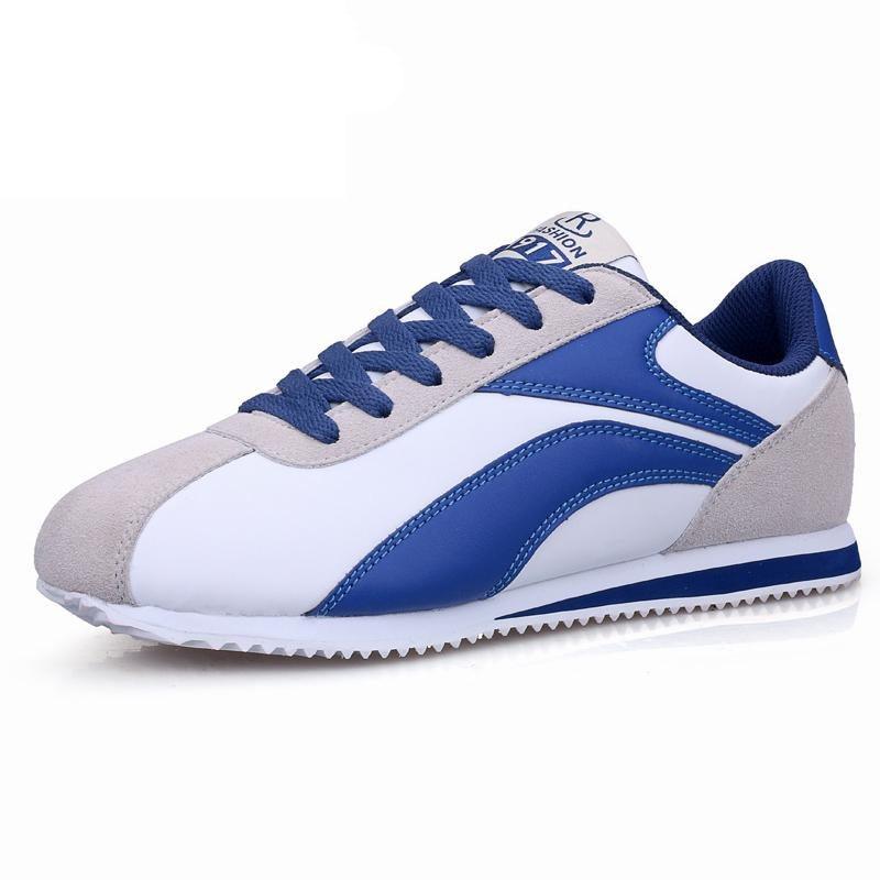 Stevvex men's athletic running sneaker in blue and white with gray suede accents on Tampa Home & Garden Store