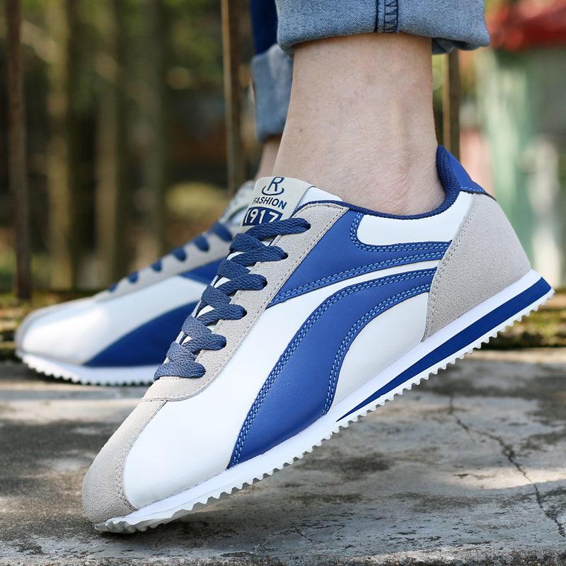 Stevvex men's athletic running sneakers in blue and white with grey suede overlays on Tampa Home & Garden Store