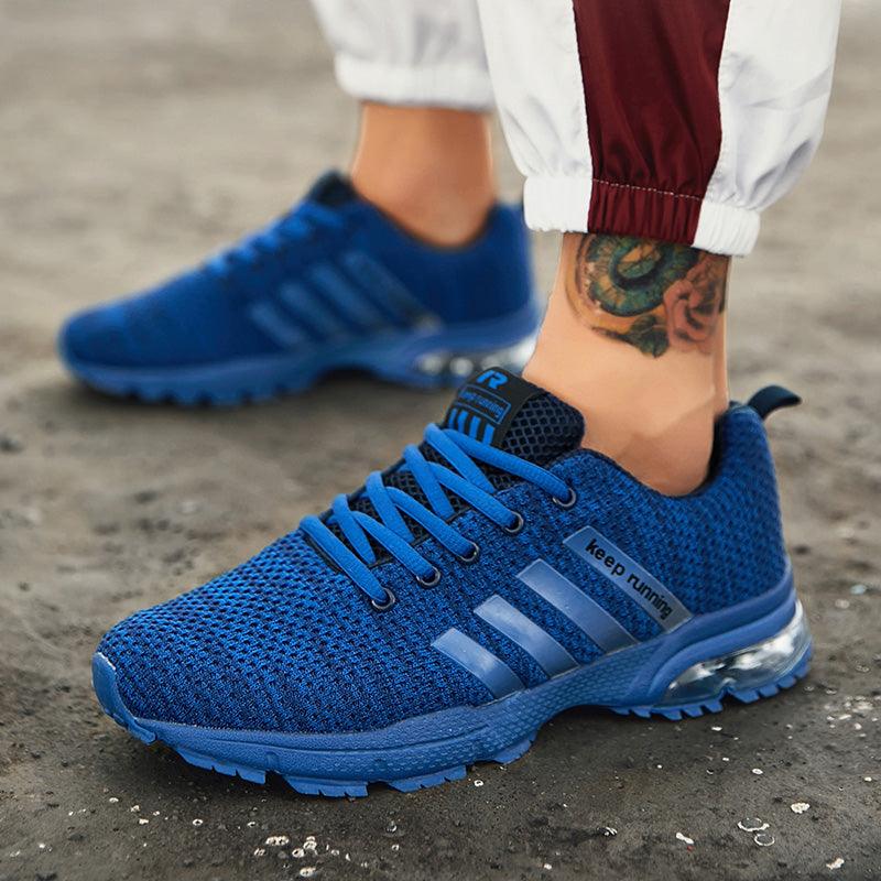 Men's blue Stevvex mesh running sneakers with breathable upper and air cushion sole, pair on Tampa Home & Garden Store