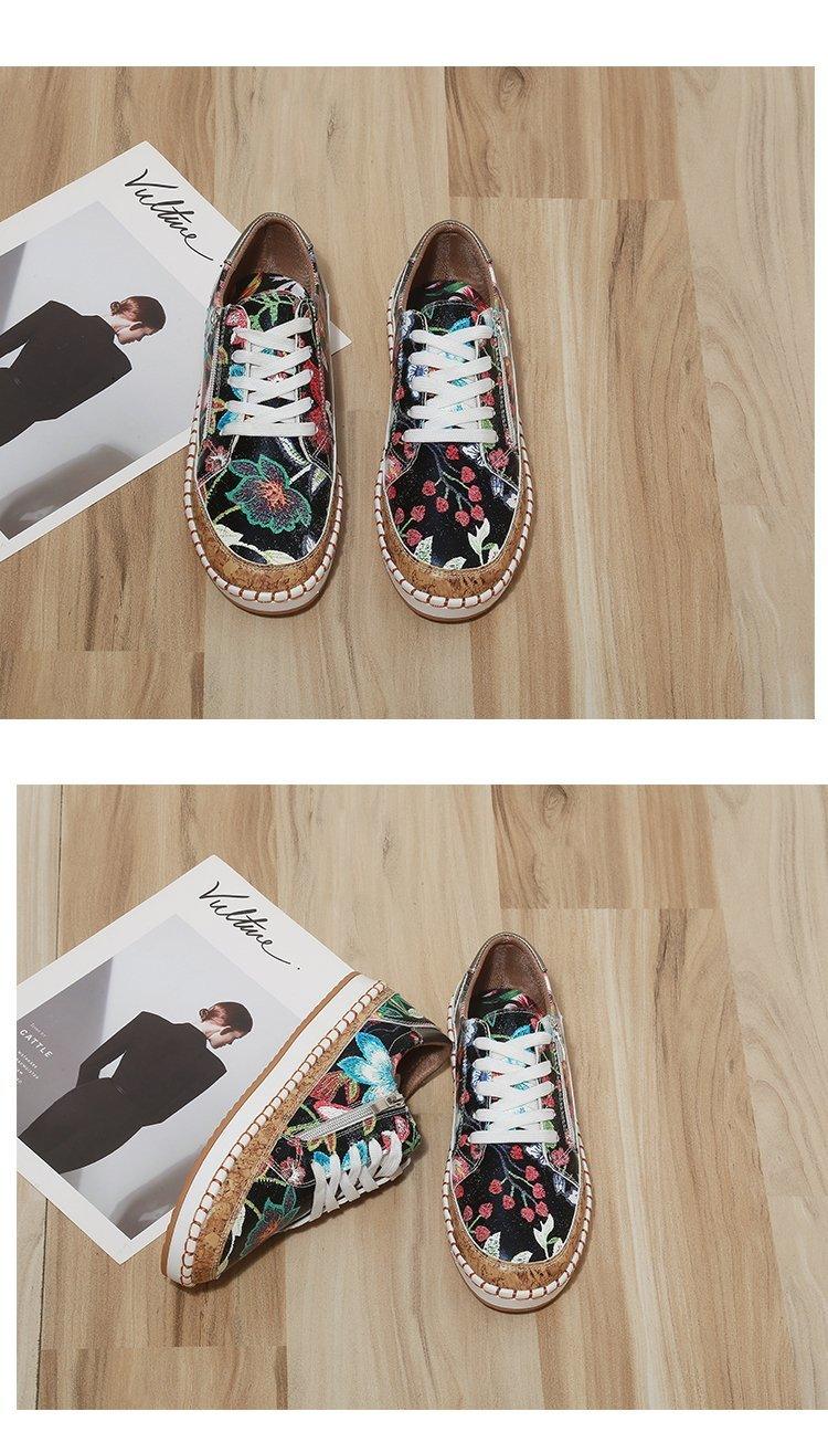 Stevvex floral print sneakers with white laces, pair showing colorful flowers on dark fabric on Tampa Home & Garden Store