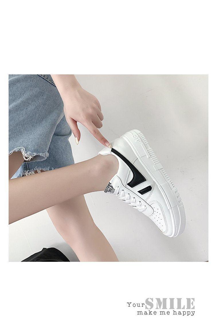Stevvex white lace-up platform sneakers with black side panels on Tampa Home & Garden Store