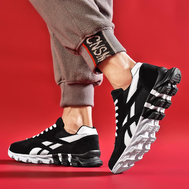 Stevvex men's running sneakers pair, black and white shoes with breathable mesh and outsole on Tampa Home & Garden Store