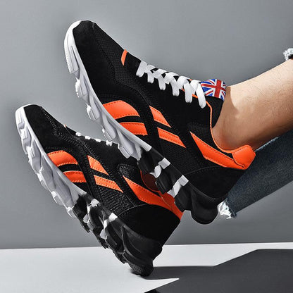 Stevvex men's running sneakers in black and orange, lightweight breathable athletic shoes on Tampa Home & Garden Store