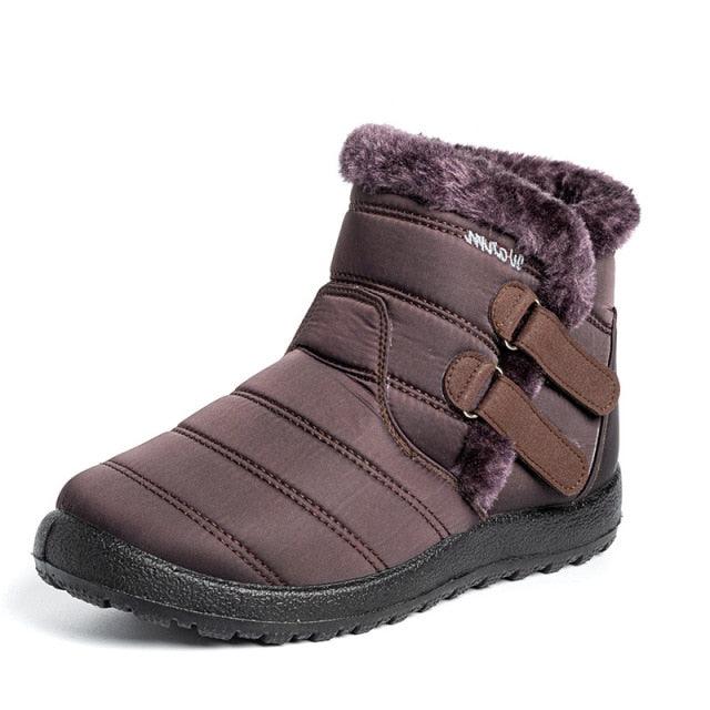 Stevvex women's waterproof ankle snow boot with purple quilted exterior and faux-fur lining on Tampa Home & Garden Store