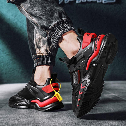 Stevvex running sneakers, black with red accents, breathable upper, rugged outsole on Tampa Home & Garden Store