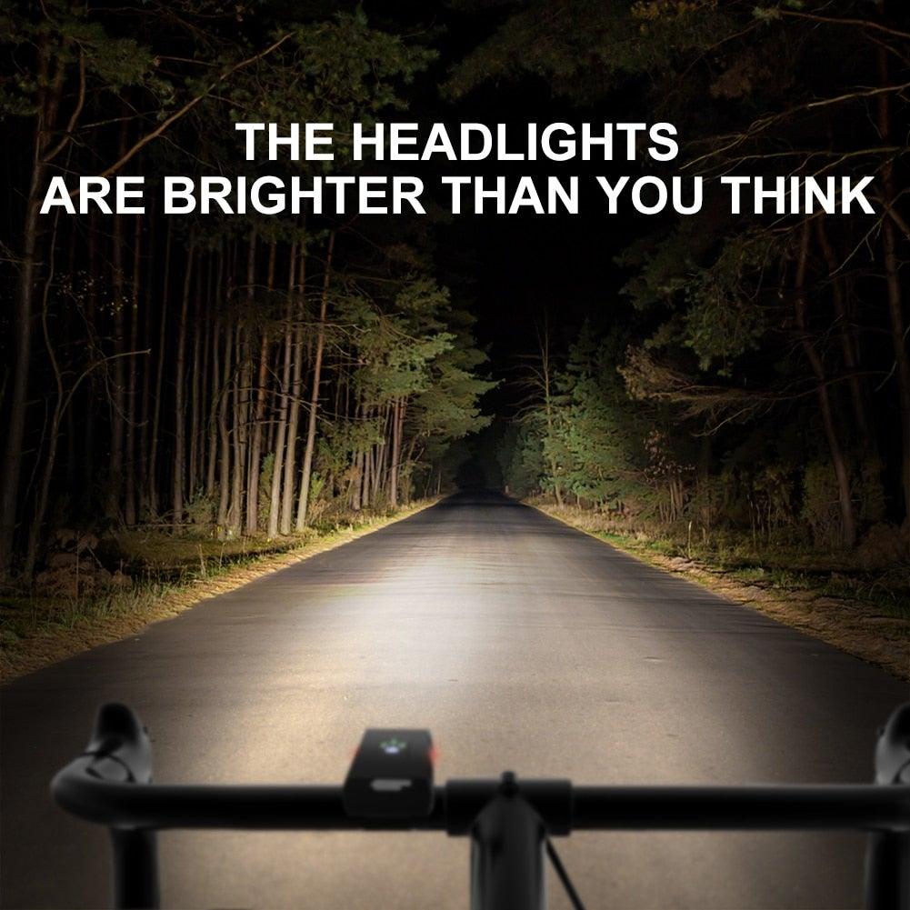 Stevvex 2-piece LED bike light set front and rear USB rechargeable lights on handlebars at night on Tampa Home & Garden Store