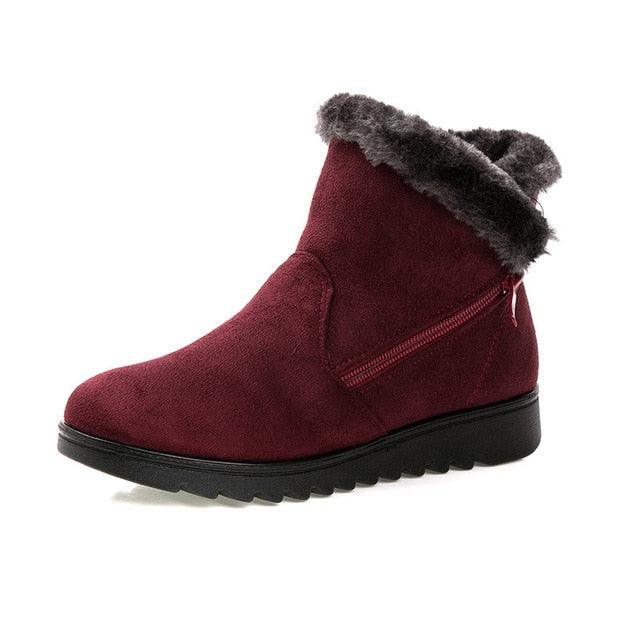Stevvex red suede ankle boots with faux fur trim and side zipper, black rubber sole on Tampa Home & Garden Store