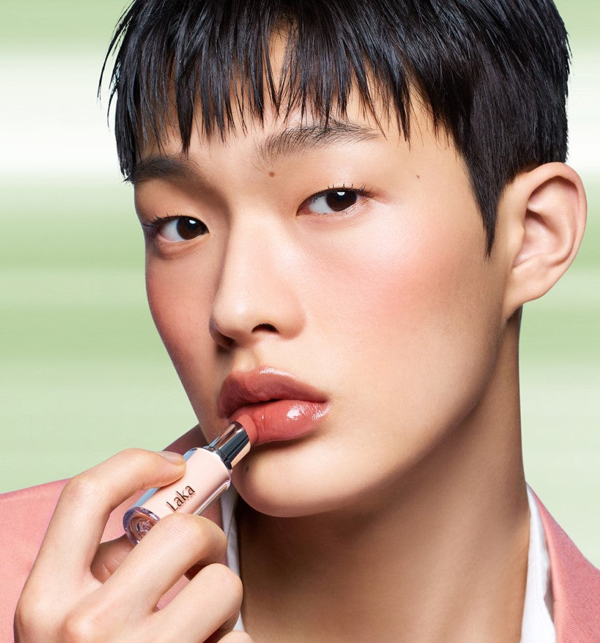 Laka Bonding Glow Lipstick by Seoulia in nude pink being applied to lips on Tampa Home & Garden Store