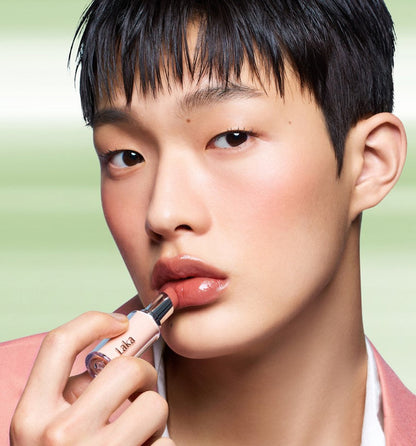 Laka Bonding Glow Lipstick by Seoulia in nude pink being applied to lips on Tampa Home & Garden Store