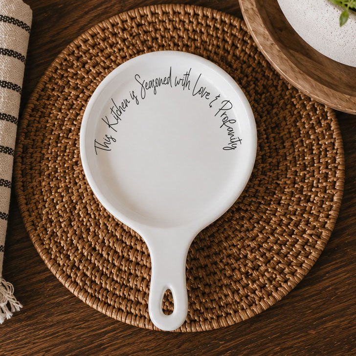 Love & Profanity spoon rest by Gia Roma, white ceramic kitchen accessory on Tampa Home & Garden Store