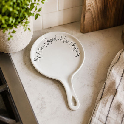 Love & Profanity spoon rest, white ceramic with black cursive text around rim on Tampa Home & Garden Store