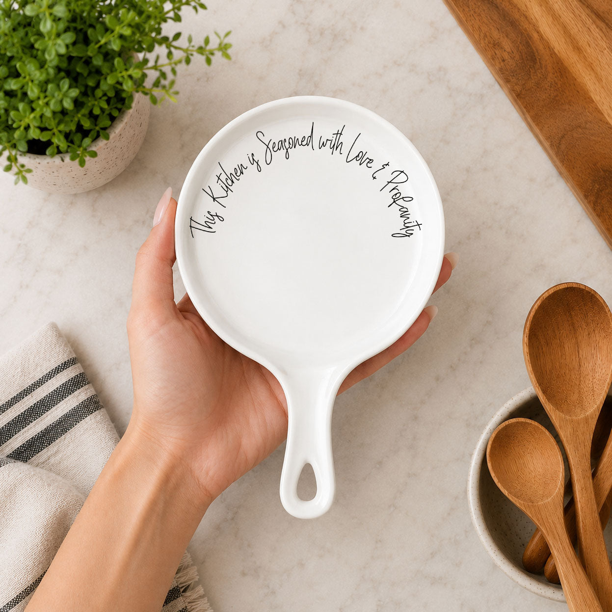 Love & Profanity spoon rest by Gia Roma, white round ceramic with black script on Tampa Home & Garden Store