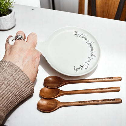 Gia Roma Love & Profanity spoon rest, white ceramic with scripted rim and three wooden spoons on Tampa Home & Garden Store