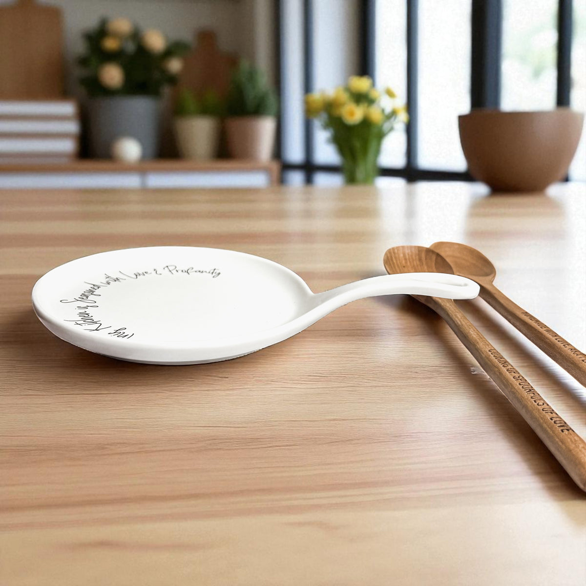 Love & Profanity spoon rest white ceramic with black script Gia Roma, two wooden spoons on Tampa Home & Garden Store