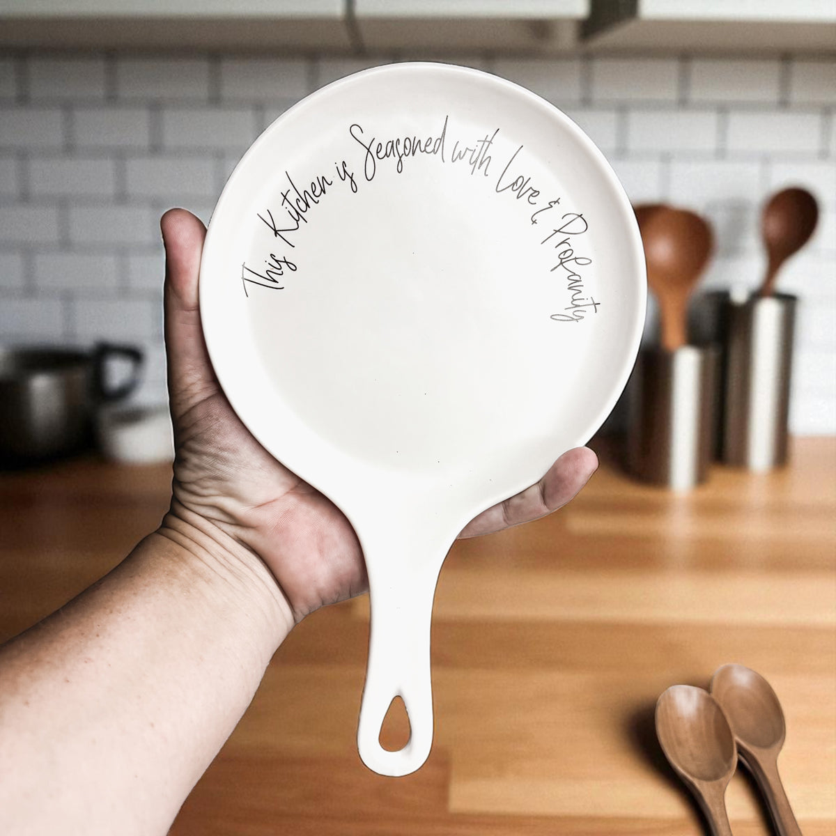 Love & Profanity spoon rest by Gia Roma, white ceramic kitchen accessory with script rim on Tampa Home & Garden Store