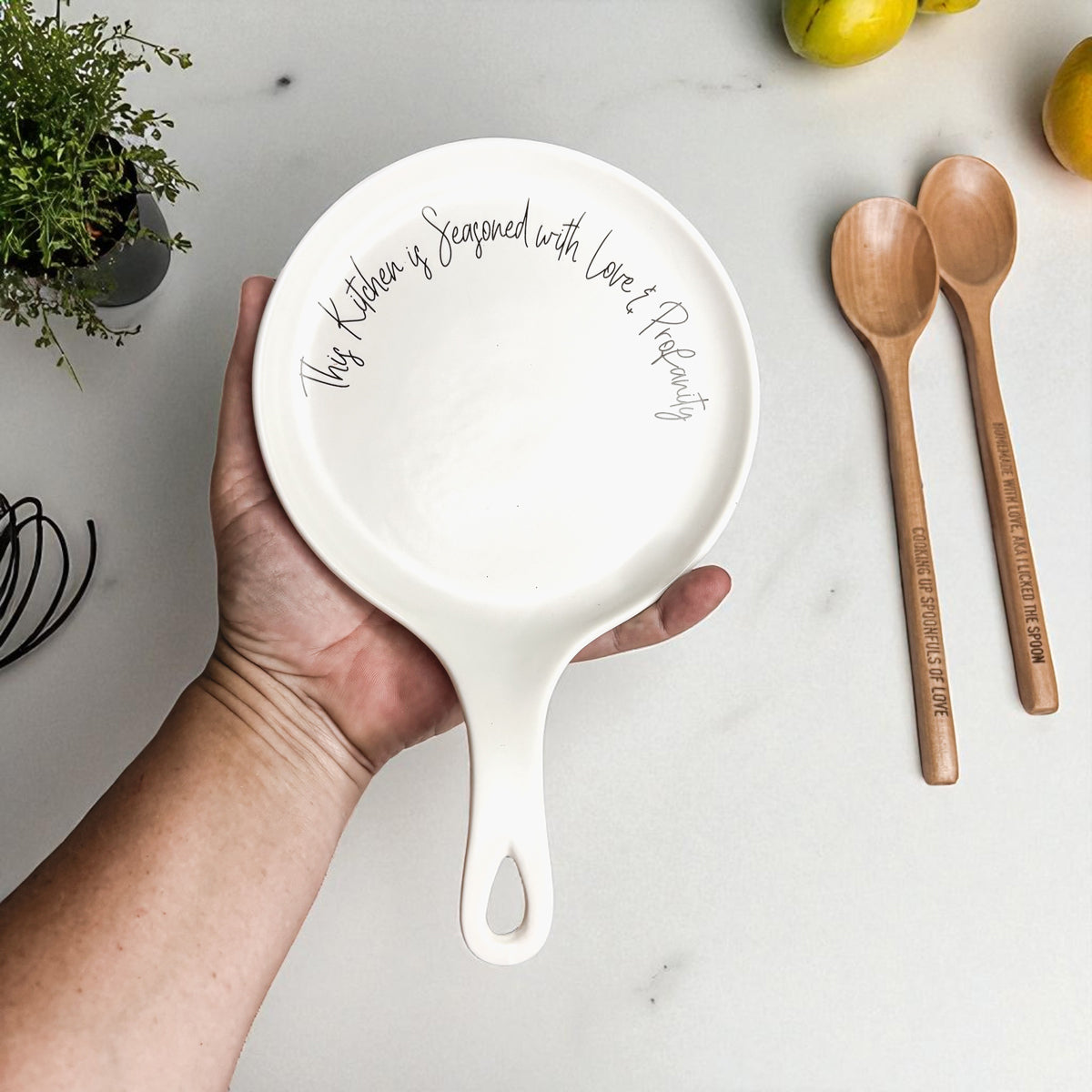 Love & Profanity spoon rest by Gia Roma, round white ceramic with script around rim on Tampa Home & Garden Store