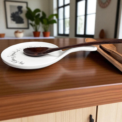 Love & Profanity spoon rest by Gia Roma, white ceramic with black script and wooden spoons on Tampa Home & Garden Store