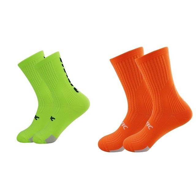 Professional cycling socks by Stevvex for men and women in lime green and orange, 2 pairs on Tampa Home & Garden Store