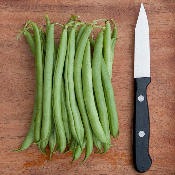 Provider Bush Bean pods, green bush beans on a wooden cutting board beside a knife on Tampa Home & Garden Store