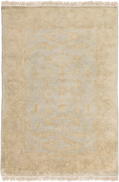 Perrysville Area Rug by Boutique Rugs, beige with subtle floral pattern and fringe on Tampa Home & Garden Store