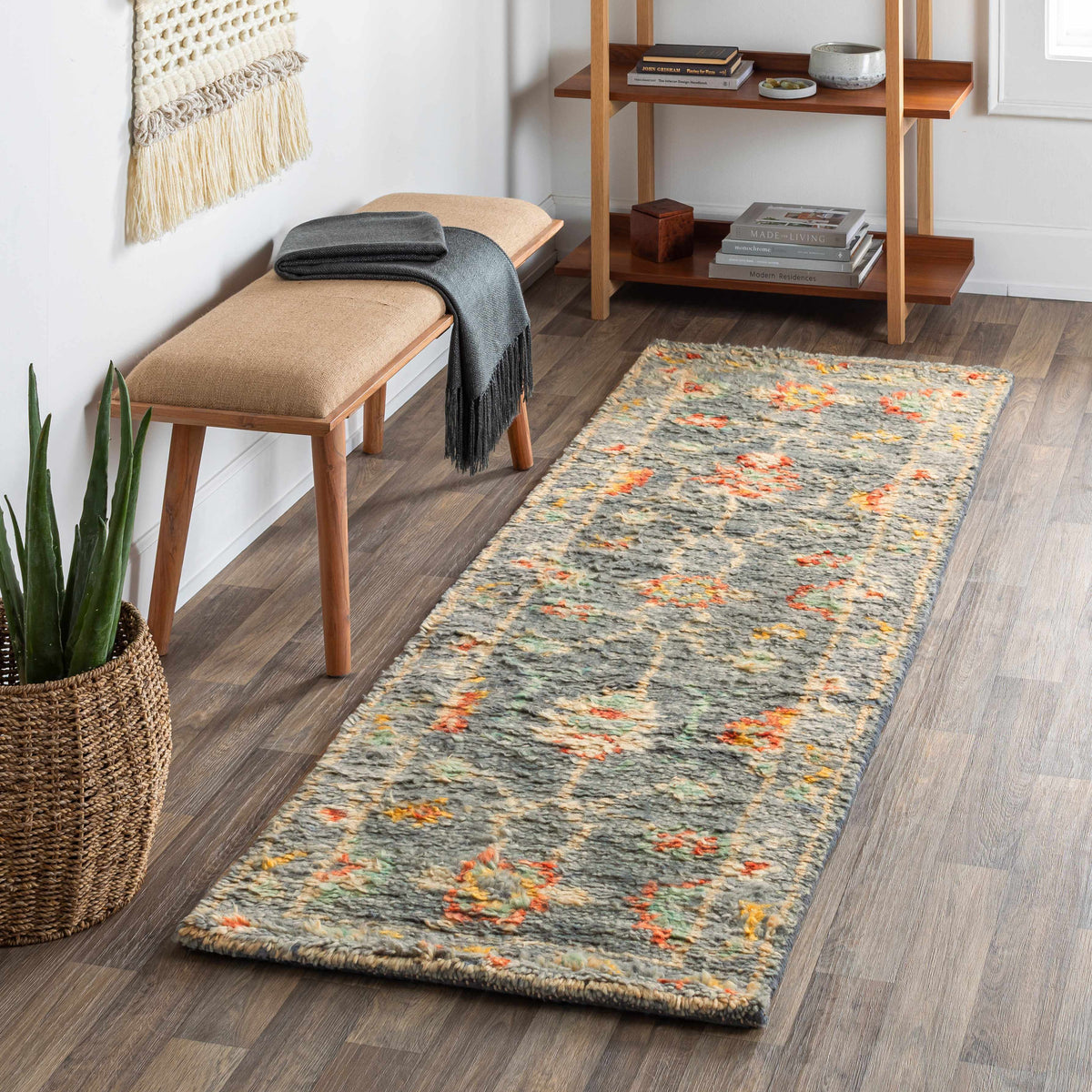 Prosperidad Handmade Wool Rug by Boutique Rugs in gray with colorful flecks on Tampa Home & Garden Store