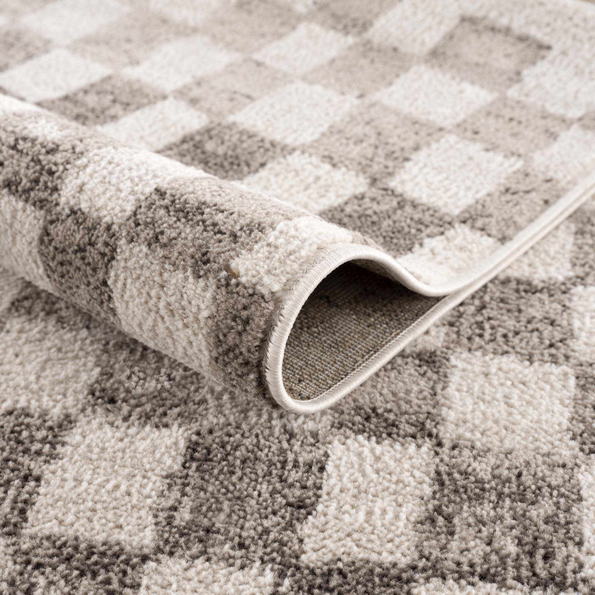 Benjy Irregular Checkboard Rug beige by Boutique Rugs on Tampa Home & Garden Store