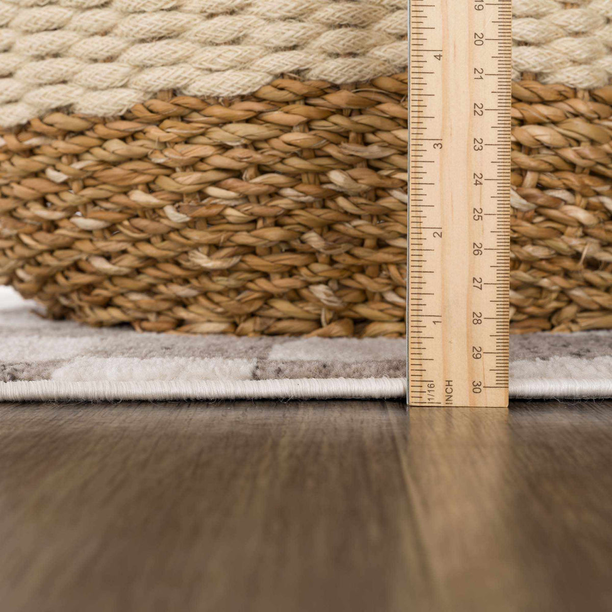 Benjy Irregular Checkboard Rug beige braided jute texture with ruler for scale Boutique Rugs on Tampa Home & Garden Store