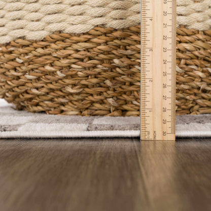 Benjy Irregular Checkboard Rug beige braided jute texture with ruler for scale Boutique Rugs on Tampa Home & Garden Store