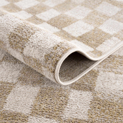 Benjy irregular checkboard rug closeup in cream and gold with textured pile Boutique Rugs on Tampa Home & Garden Store