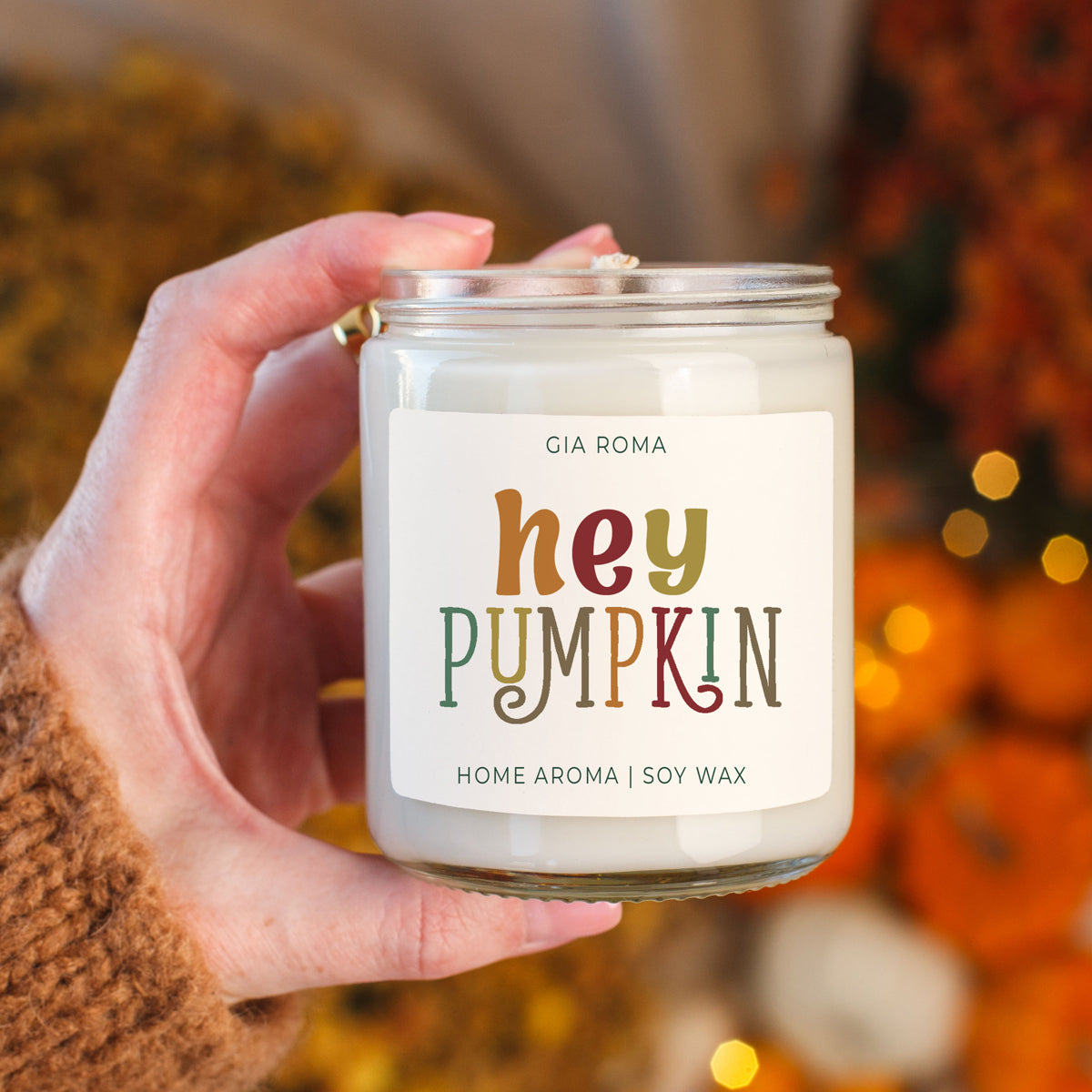 Baked Pumpkin candle by Gia Roma in a white glass jar, soy wax, colorful hey pumpkin label on Tampa Home & Garden Store
