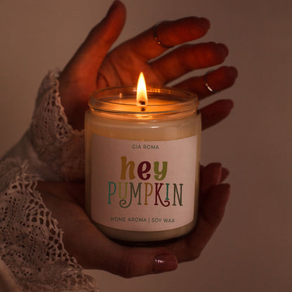 Candle Baked Pumpkin by Gia Roma, soy wax, warm glow held by hands on Tampa Home & Garden Store