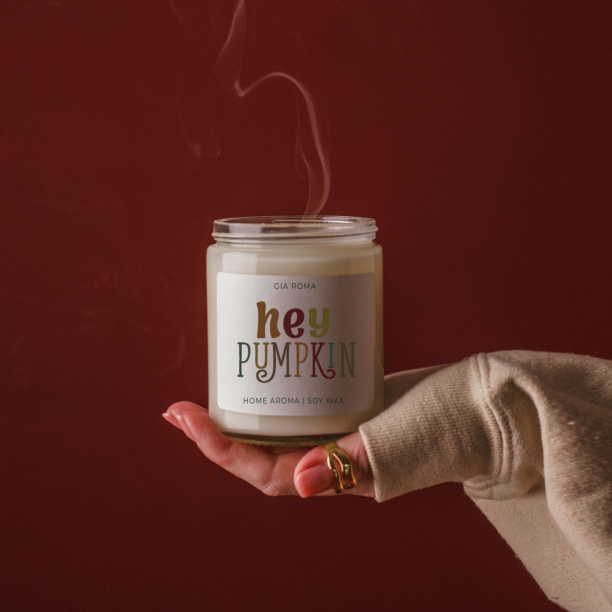 Baked Pumpkin Candle by Gia Roma in a clear glass jar with cream wax and a colorful label on Tampa Home & Garden Store