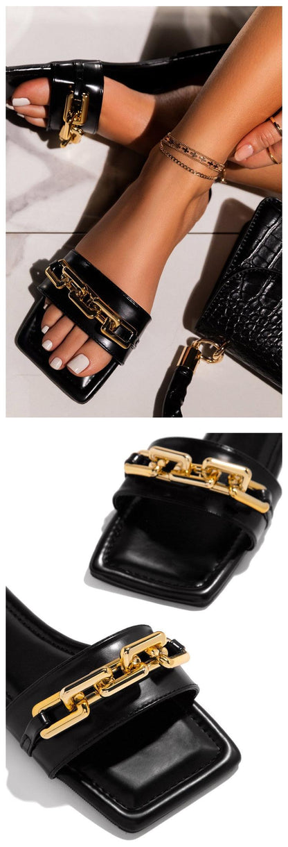Black leather slide sandals with gold chain strap by Stevvex, square toe on Tampa Home & Garden Store