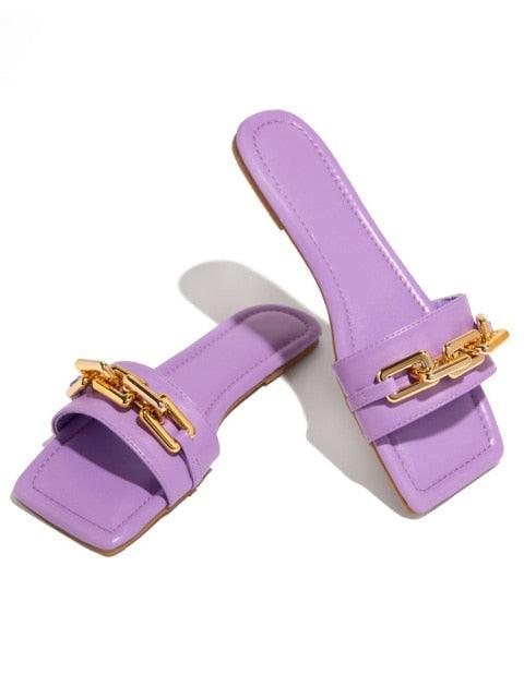 Purple women's leather sandals with gold chain detail by Stevvex, square-toe slides, pair on Tampa Home & Garden Store