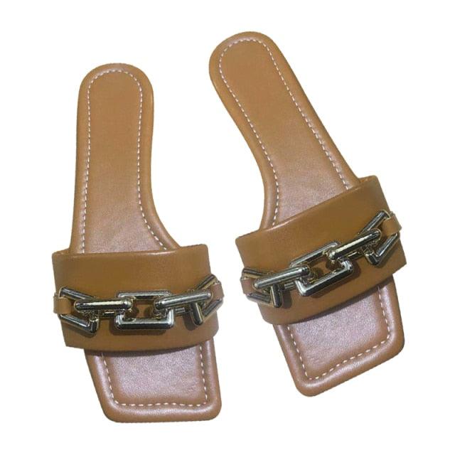 Leather chain slide sandals in tan brown with silver hardware, two shown on Tampa Home & Garden Store