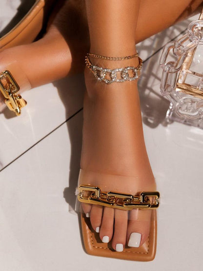 Stevvex leather sandals with a chunky gold chain front strap on tan footbed on Tampa Home & Garden Store