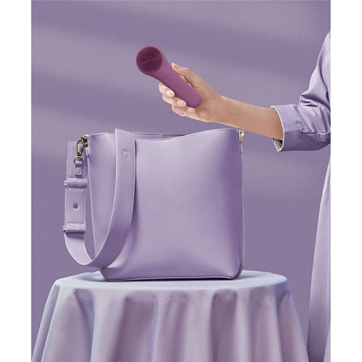 X-Level X-Fresh facial cleansing device, purple silicone handheld brush with round head on Tampa Home & Garden Store