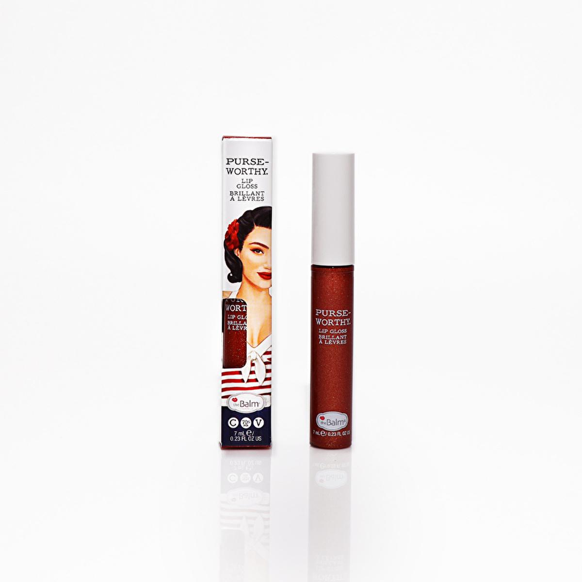 theBalm Purseworthy Lip Gloss tube with red shimmer beside its vintage-style box, two-piece set on Tampa Home & Garden Store