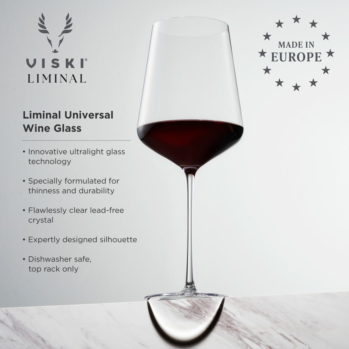 Liminal Universal stemmed wine glass Viski with slender stem and red wine on canvas on Tampa Home & Garden Store
