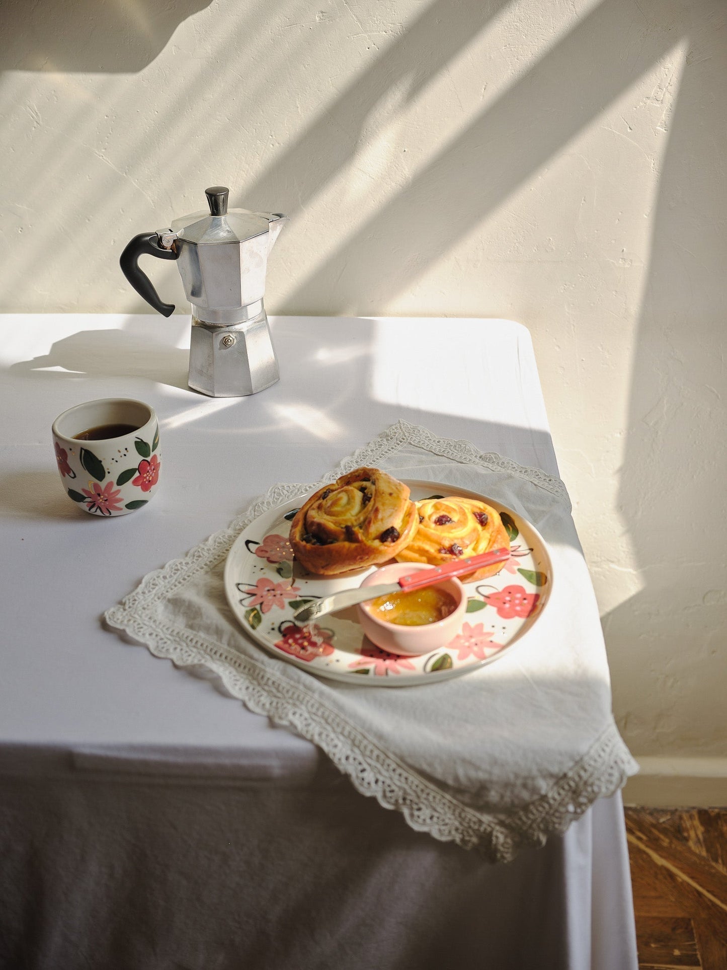 Hand-Painted Floral Coffee Cup on White Base