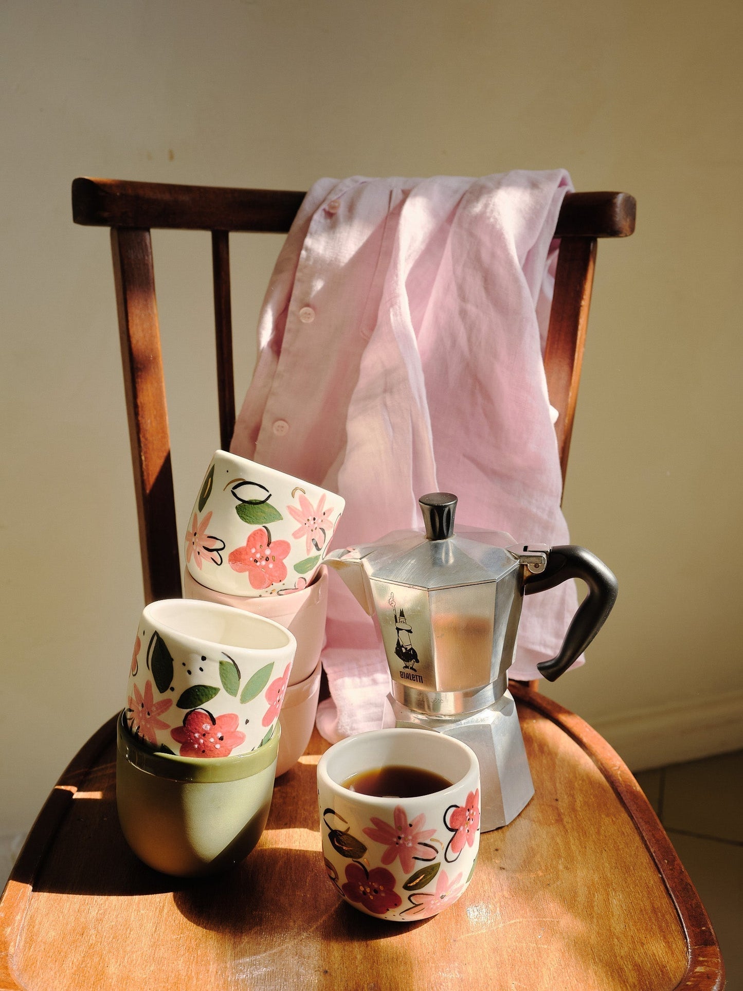 Hand-Painted Floral Coffee Cup on White Base