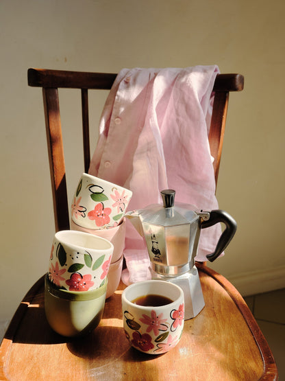 Hand-Painted Floral Coffee Cup on White Base