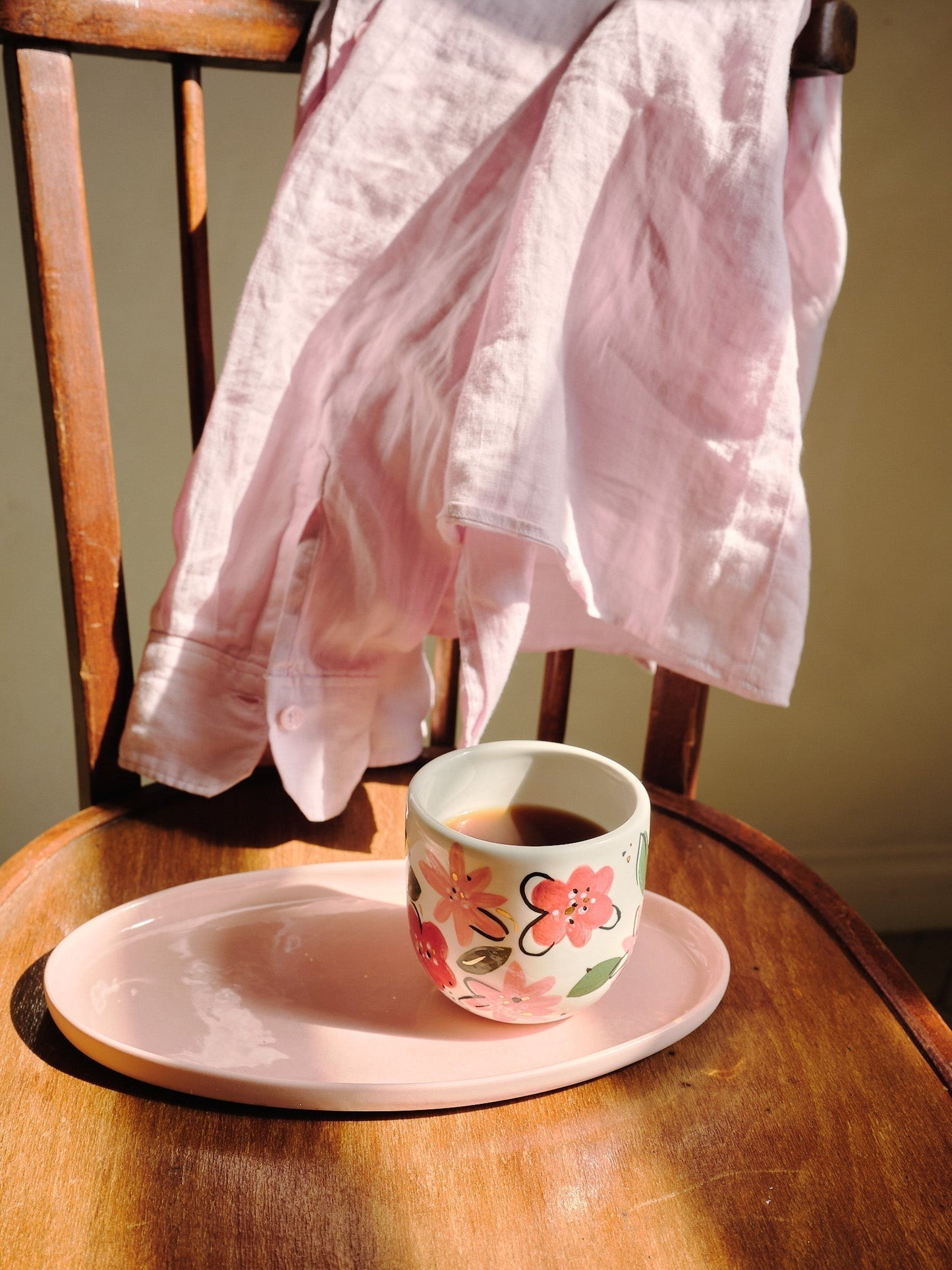 Hand-Painted Floral Coffee Cup on White Base
