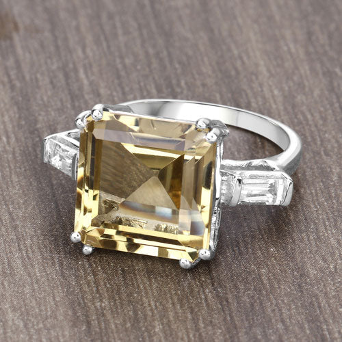 Sterling silver ring with a lemon quartz center and white topaz accents on Tampa Home & Garden Store