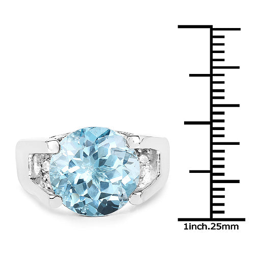 Sterling silver ring with 7.21ct blue topaz centerpiece and white cubic zirconia accents on Tampa Home & Garden Store