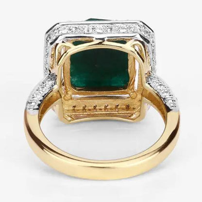 Ring with 5.18ct dyed emerald center and white topaz halo on a two-tone gold and silver band .925 on Tampa Home & Garden Store