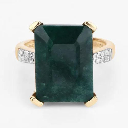 Dyed emerald and white diamond ring with 7.64ct emeraldcut center, gold-tone prongs, on Tampa Home & Garden Store
