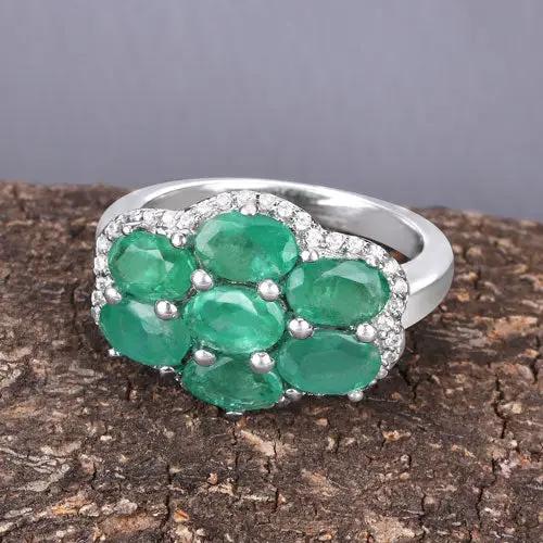 Ring with five green Zambian emeralds and white zircon accents in a sterling silver setting on Tampa Home & Garden Store