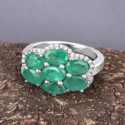 Ring with five green Zambian emeralds and white zircon accents in a sterling silver setting on Tampa Home & Garden Store